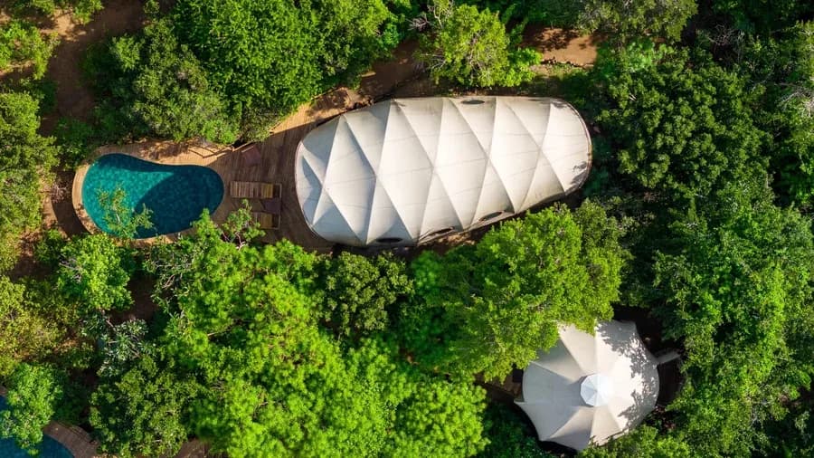 Aerial view of Wild Coast’s Family Cocoon Pool Suite and adjoining Urchin tent