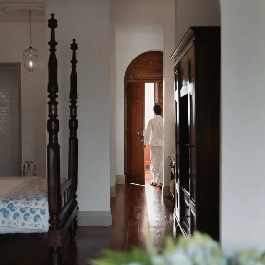 Amangalla Chamber with a four-poster bed and adjoining living space