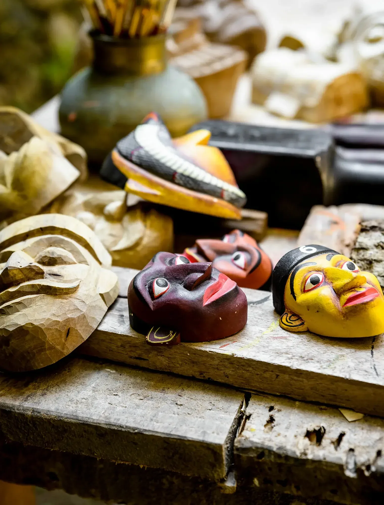 Traditional Sri Lankan wooden masks and carved figures illustrating southern craft heritage