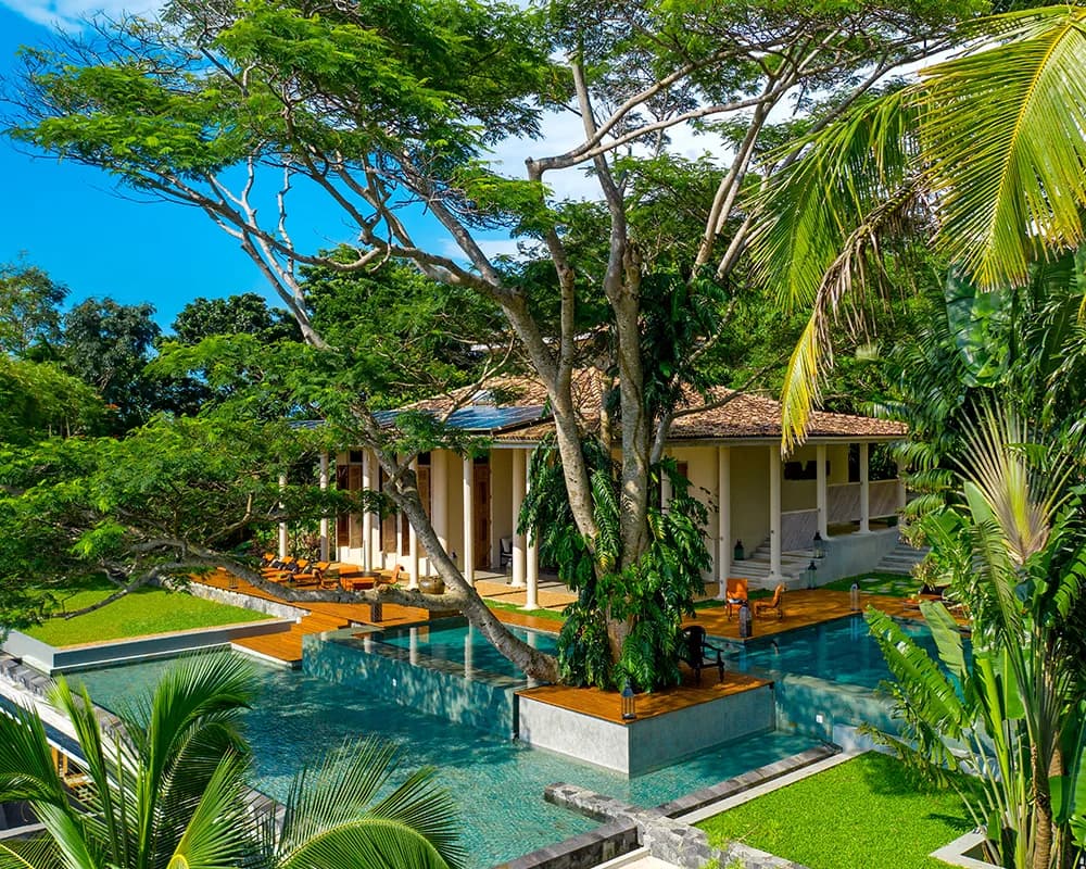 Haritha’s two-bedroom colonial mansion overlooking a shared infinity pool and tropical garden