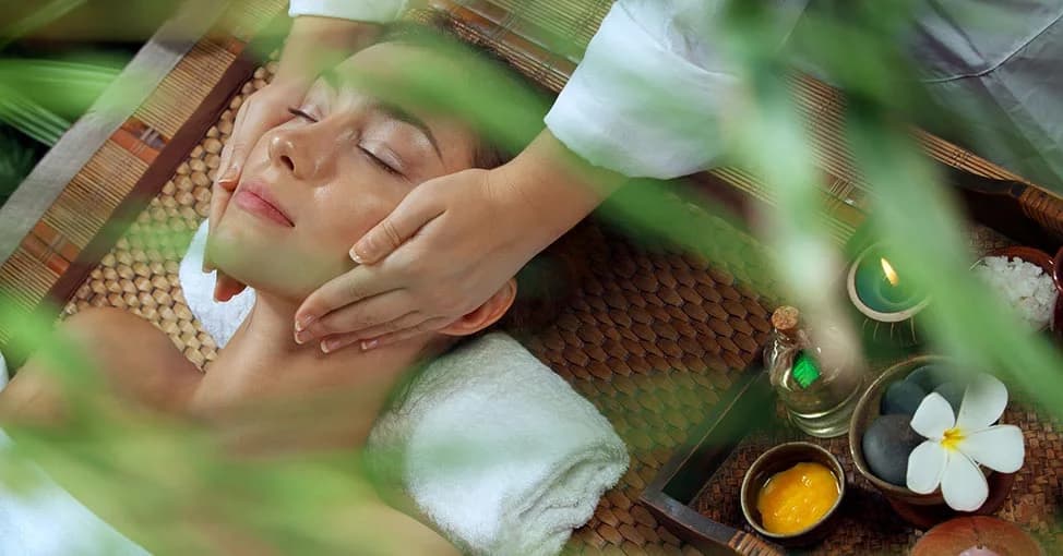 Restorative facial treatment with botanical oils at Haritha’s Jungle Spa