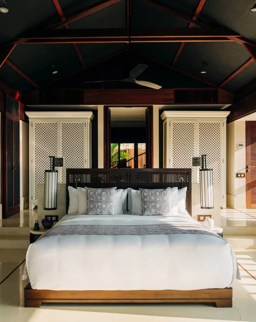 Split-level suite bedroom with a vaulted timber ceiling at ÀNI Sri Lanka